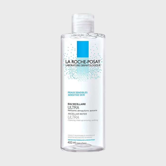 Bottle displays micellar water with label text detailing brand â€œLa Roche-Posayâ€ and features for sensitive skin; transparent with a white and blue design.