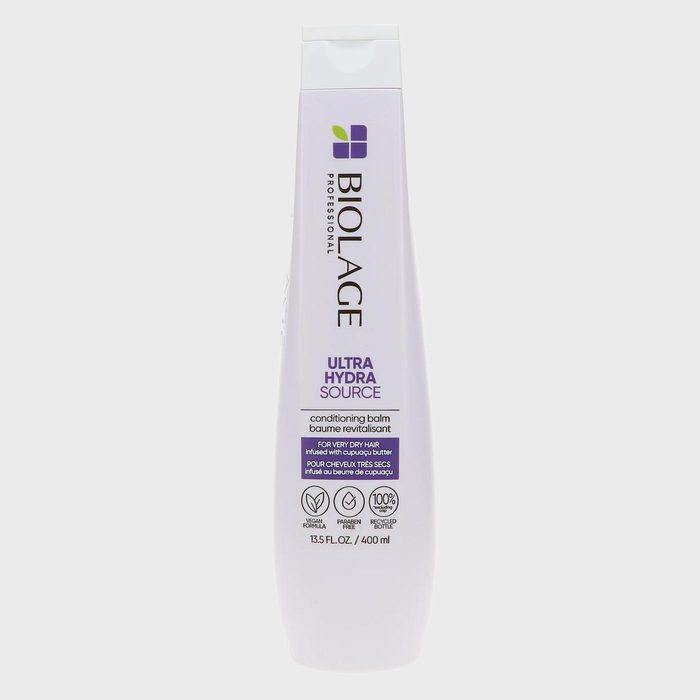 Bottle displays hair conditioning balm with 