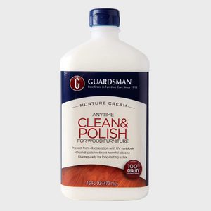 Bottle displays cleaning polish, standing upright. It features brand name 