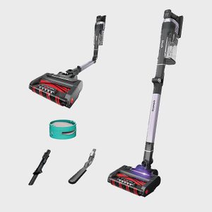 Vacuum cleaner displayed in two positions with attachments; includes a teal storage container, nozzle accessory, and a slim cleaning tool in a plain setting.