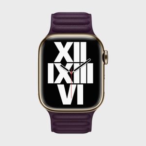 A smartwatch displays large white Roman numerals (XII, IX, VI). It has a purple strap and gold casing on a gray background.