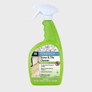 A green spray bottle holds 