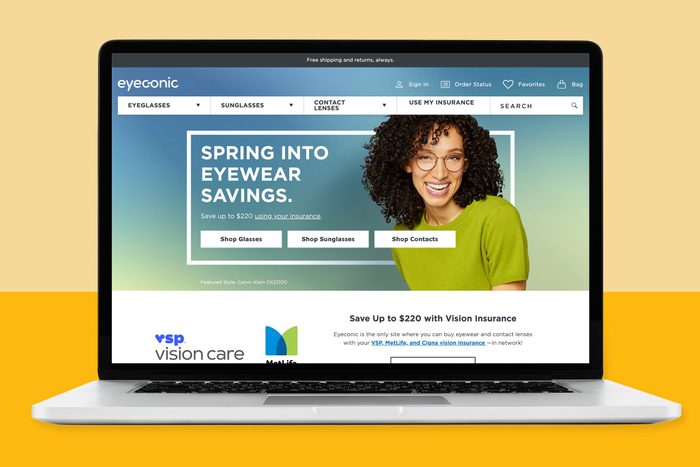 Laptop displays an online eyewear store homepage featuring savings promo, navigation bar, and a smiling person. Background is yellow and blue gradient.