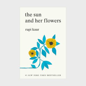 A book cover features stylized yellow flowers with blue leaves, titled 