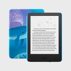 E-reader displaying text; rests against a cover with a blue whale and starry sky, set within a plain background.