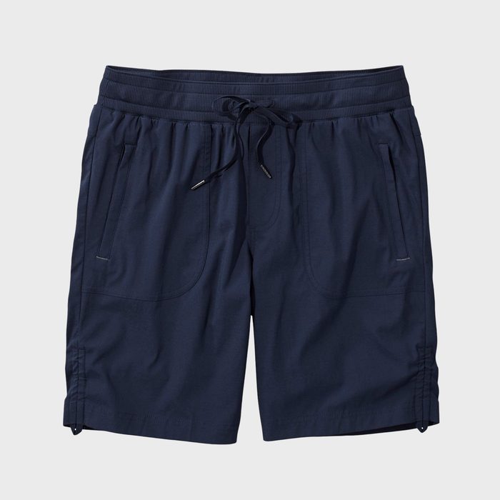 Navy blue shorts with a drawstring waistband, featuring pockets, displayed on a plain white background.