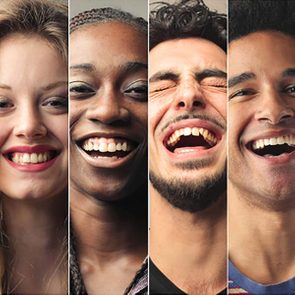 Four individuals laugh joyfully, close-up faces framed vertically, creating a lively and diverse expression of happiness.