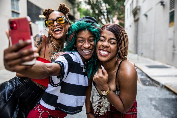 Young women taking a selfie in urban area