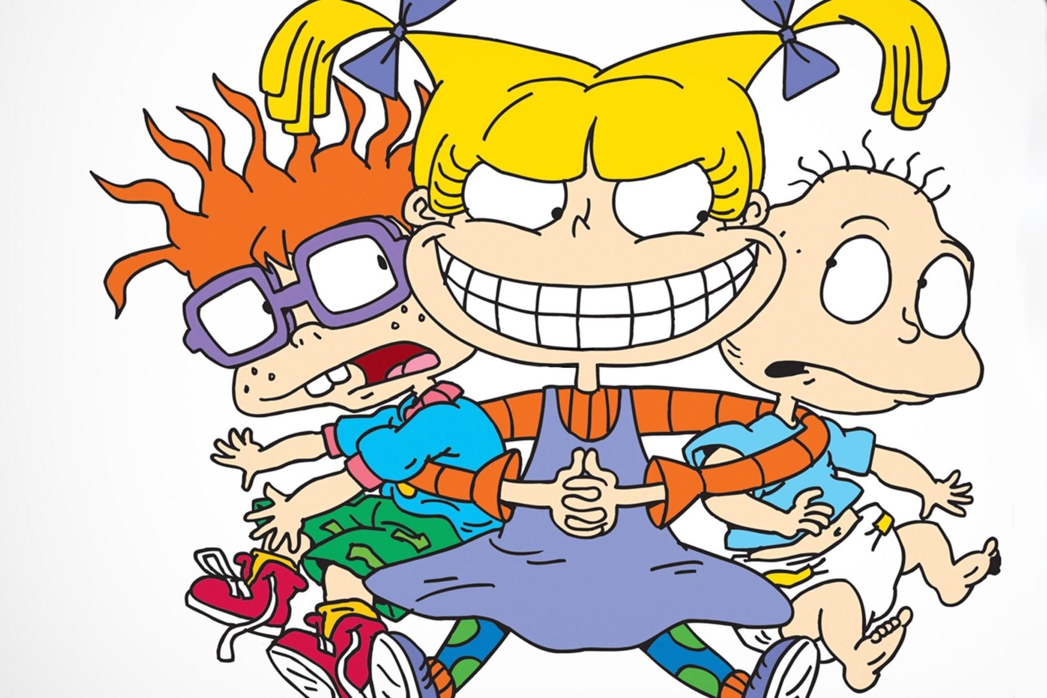 Three cartoon characters, two held by a girl with pigtails and a mischievous grin, are set against a plain white background.