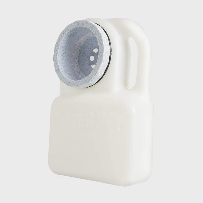 White plastic jug with a wide, angled spout and handle, situated against a light gray background.