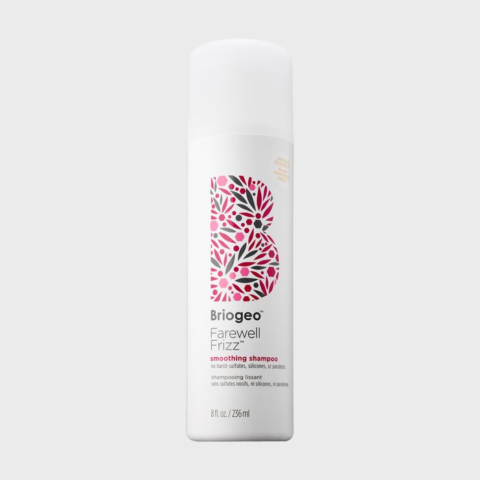 A white bottle displays floral 