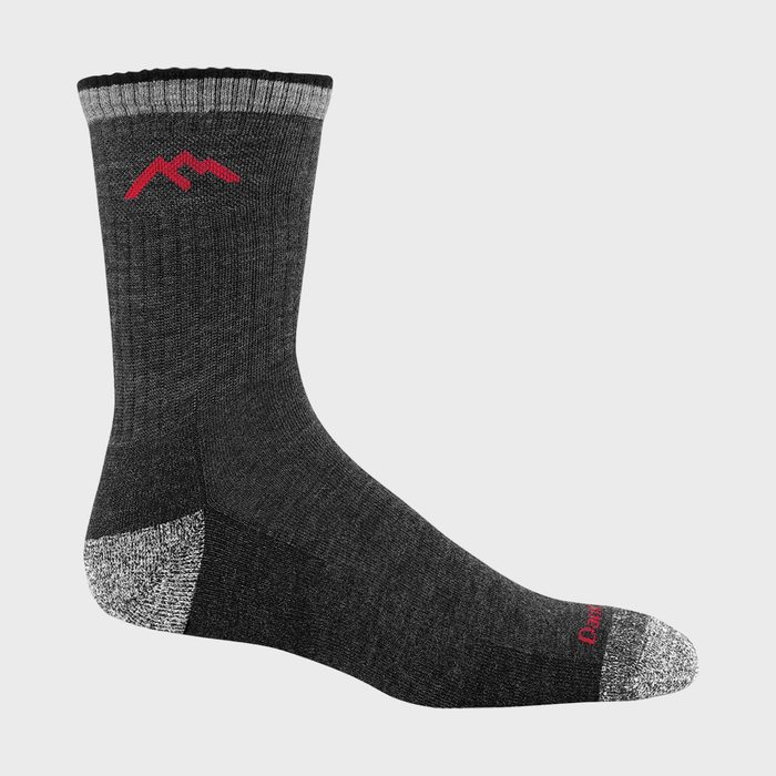 A gray sock features reinforced heel and toe, a red logo near the calf, displayed on a plain background.