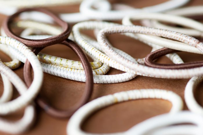 Hair Elastics on Brown Background