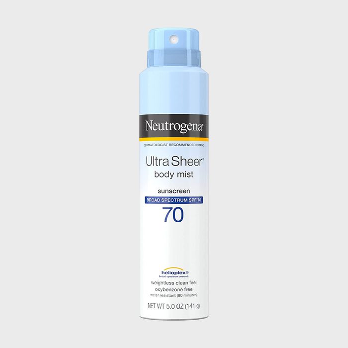A Neutrogena Ultra Sheer body mist spray can displays SPF 70 sunscreen, emphasizing its lightweight, clean feel and water resistance for 80 minutes.