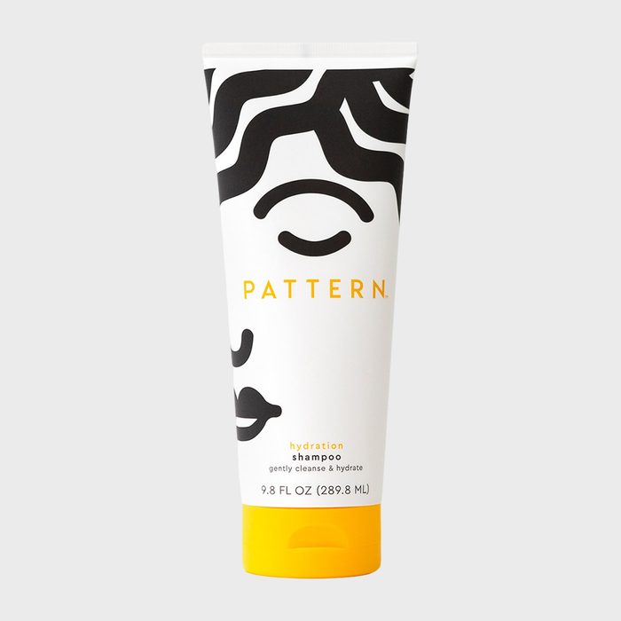 Shampoo tube features bold black design, labeled 