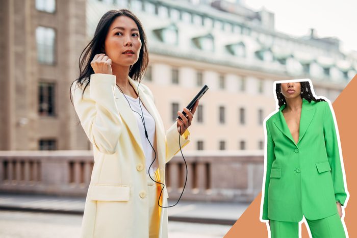 Woman in yellow blazer holds phone, wearing earbuds, walking outdoors. Another image shows a green blazer on an orange background overlay.