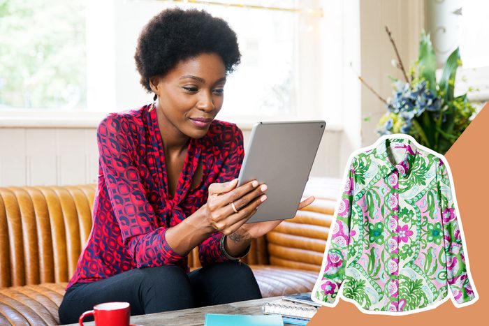 A person in a red patterned blouse uses a tablet on a sofa; nearby, a floral shirt is displayed against a colorful background.