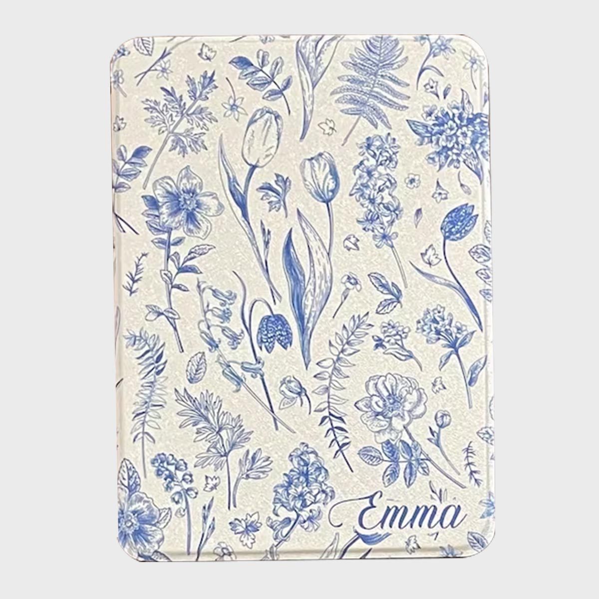 Blue floral patterns cover a light-colored background with the name "Emma" elegantly written at the bottom right corner.