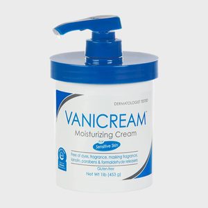 Pump bottle dispenses moisturizing cream, labeled for sensitive skin, dermatologist tested, with a blue and white design. Contains 1lb (453g).