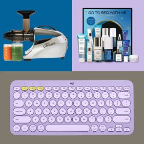 Juicer dispensing juice beside jars, cosmetics set displayed with skincare products, and lavender wireless keyboard resting against a neutral background.