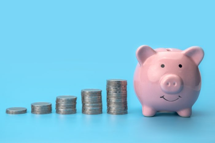Money stack step up growing growth saving money, Concept financial business investment, Coins stack arranged as a graph.