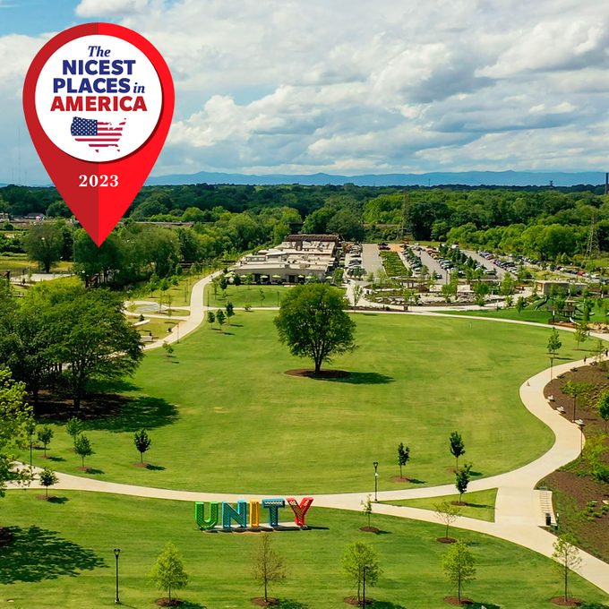 Red location marker highlights a large green park displaying 