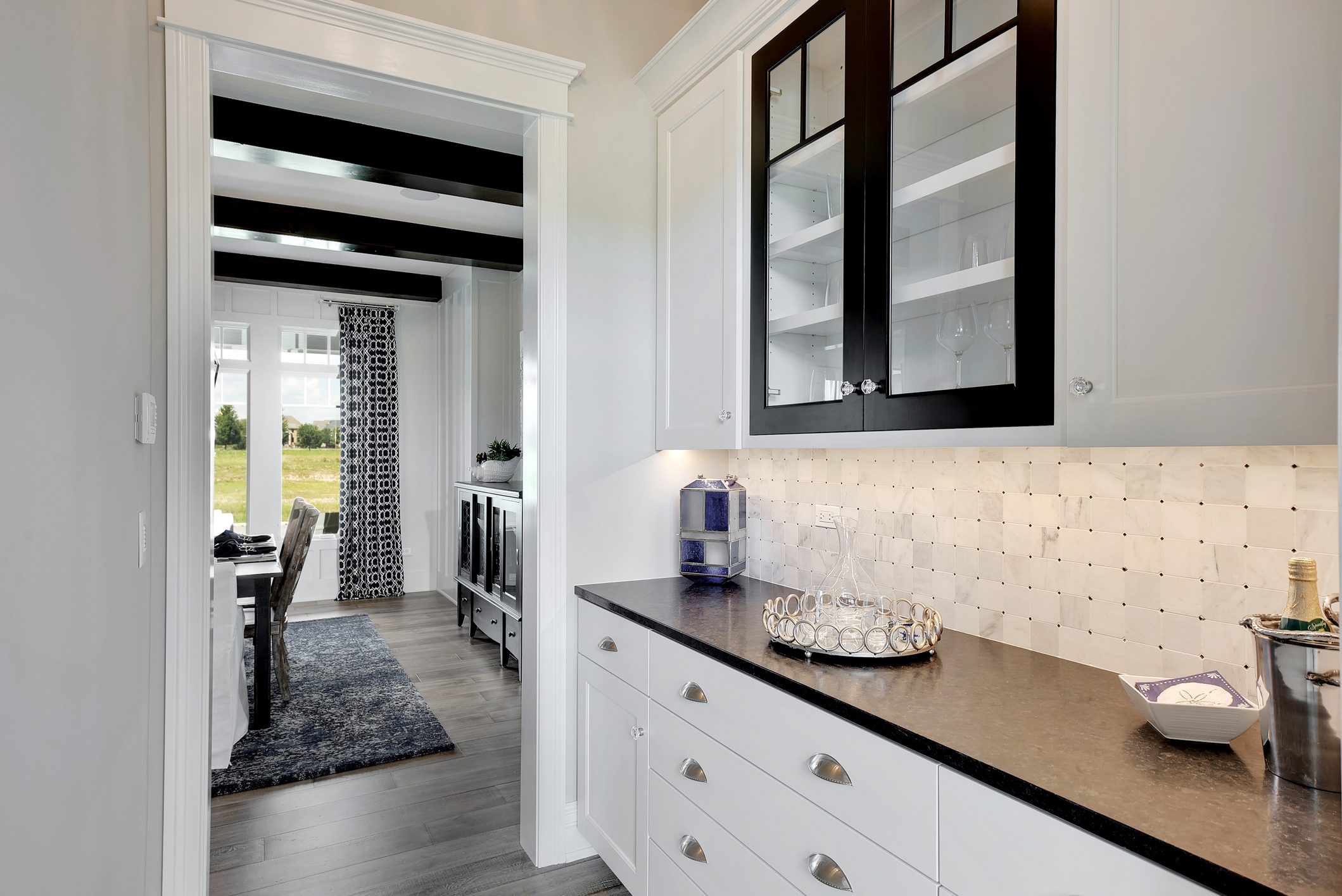 Butler pantry with visual continuity