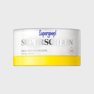 A moisturizer jar labeled 