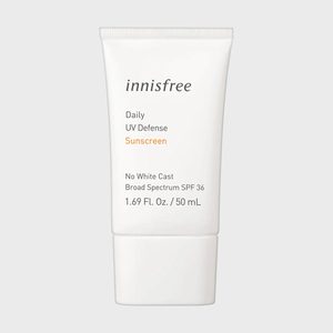 Tube labeled â€œinnisfree Daily UV Defense Sunscreenâ€ sits upright, against a plain background, indicating SPF 36 protection and no white cast.