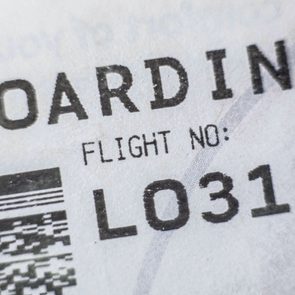 A boarding pass shows 
