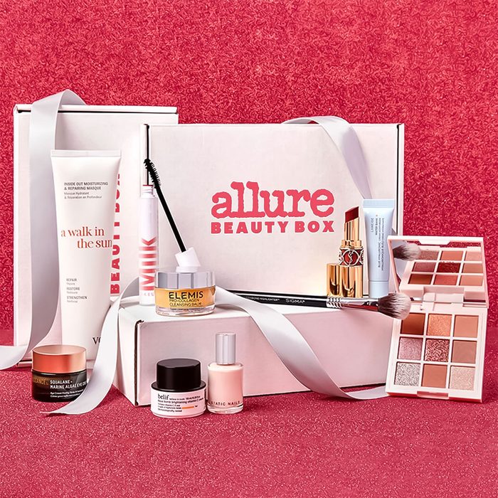 Beauty products arranged in front of a box labeled 