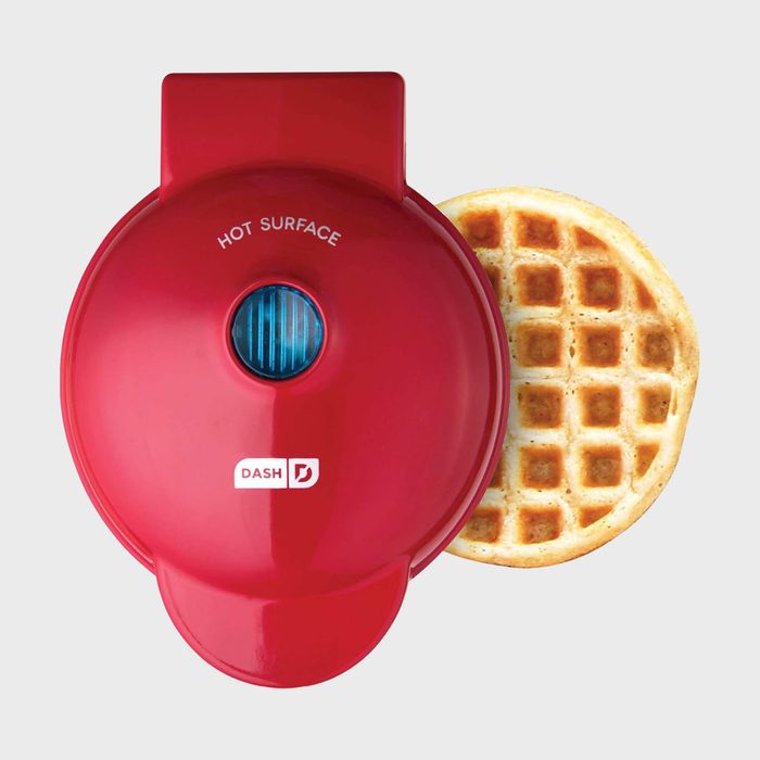 Red waffle maker creates a golden waffle; labeled 