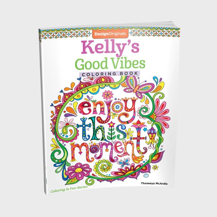 Colorful book cover features intricate floral designs and vibrant typography reading 