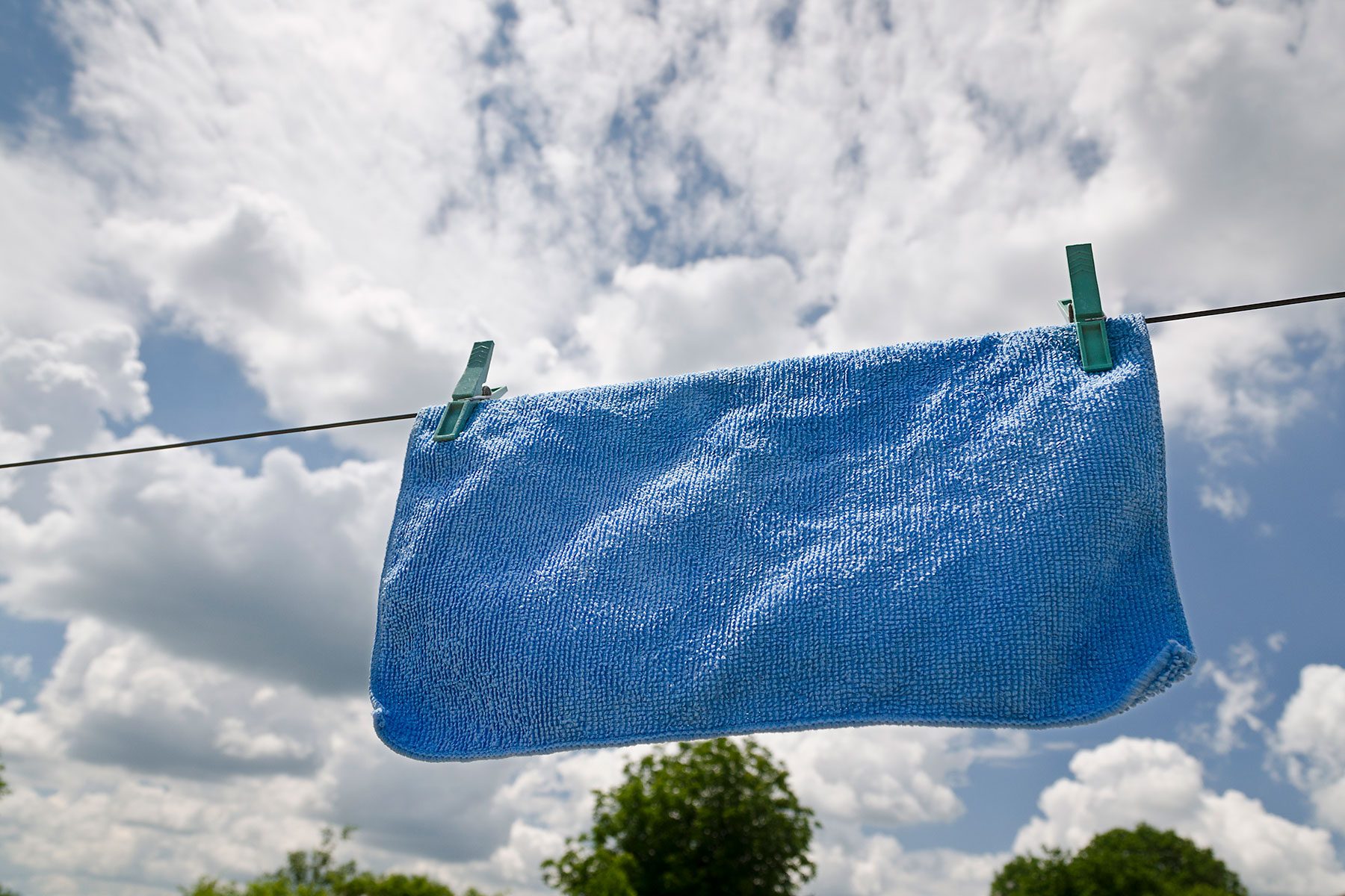 Microfibre cloth drying on wire out in open