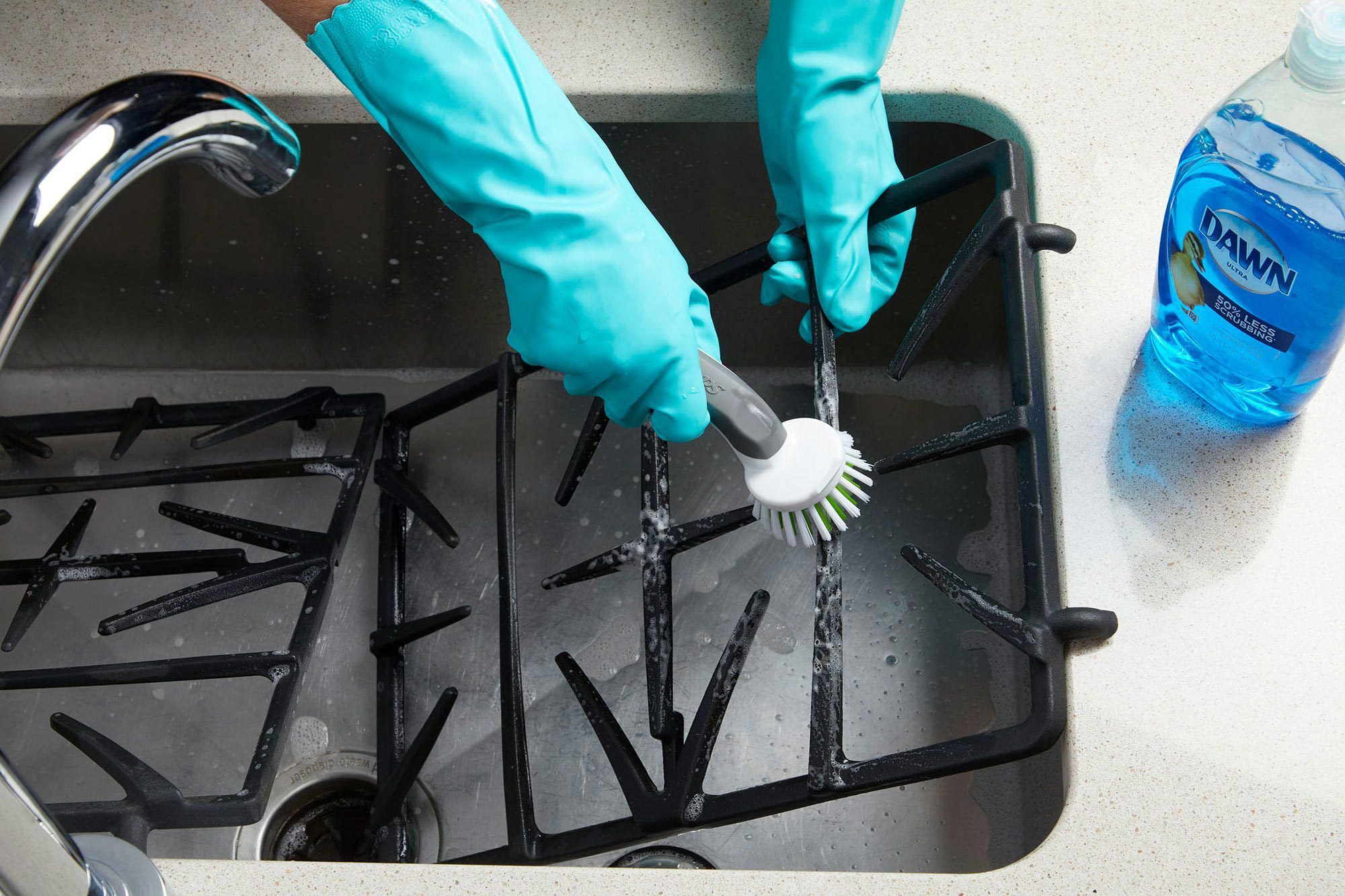 cleaning oven grates in a sink
