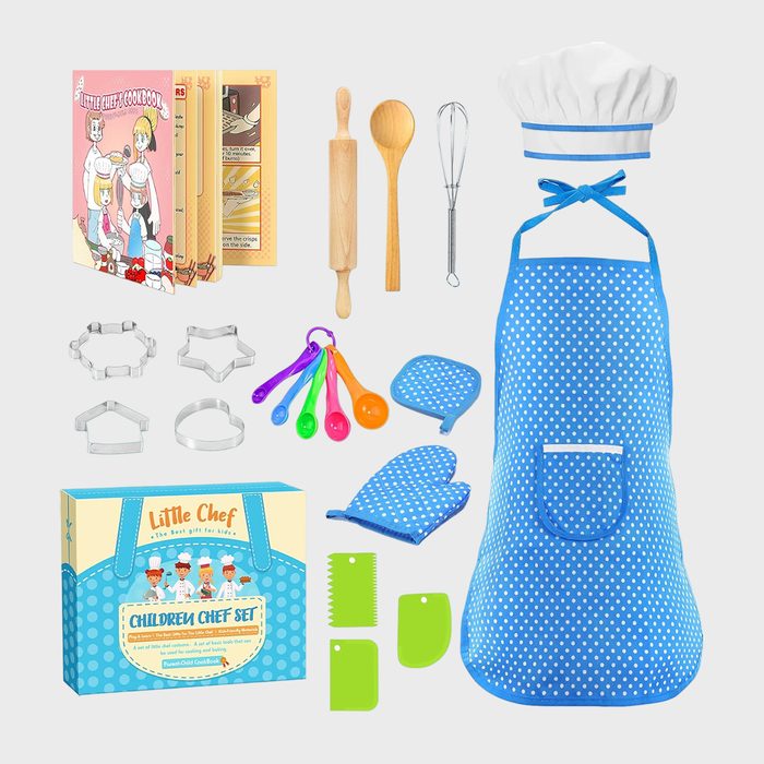 Children's cooking set includes blue polka-dot apron, chef's hat, rolling pin, spoon, whisk, colorful measuring spoons, cookie cutters, cookbook, box.