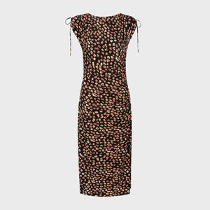 The floral-patterned black dress hangs with tie straps, displayed against a plain white background.