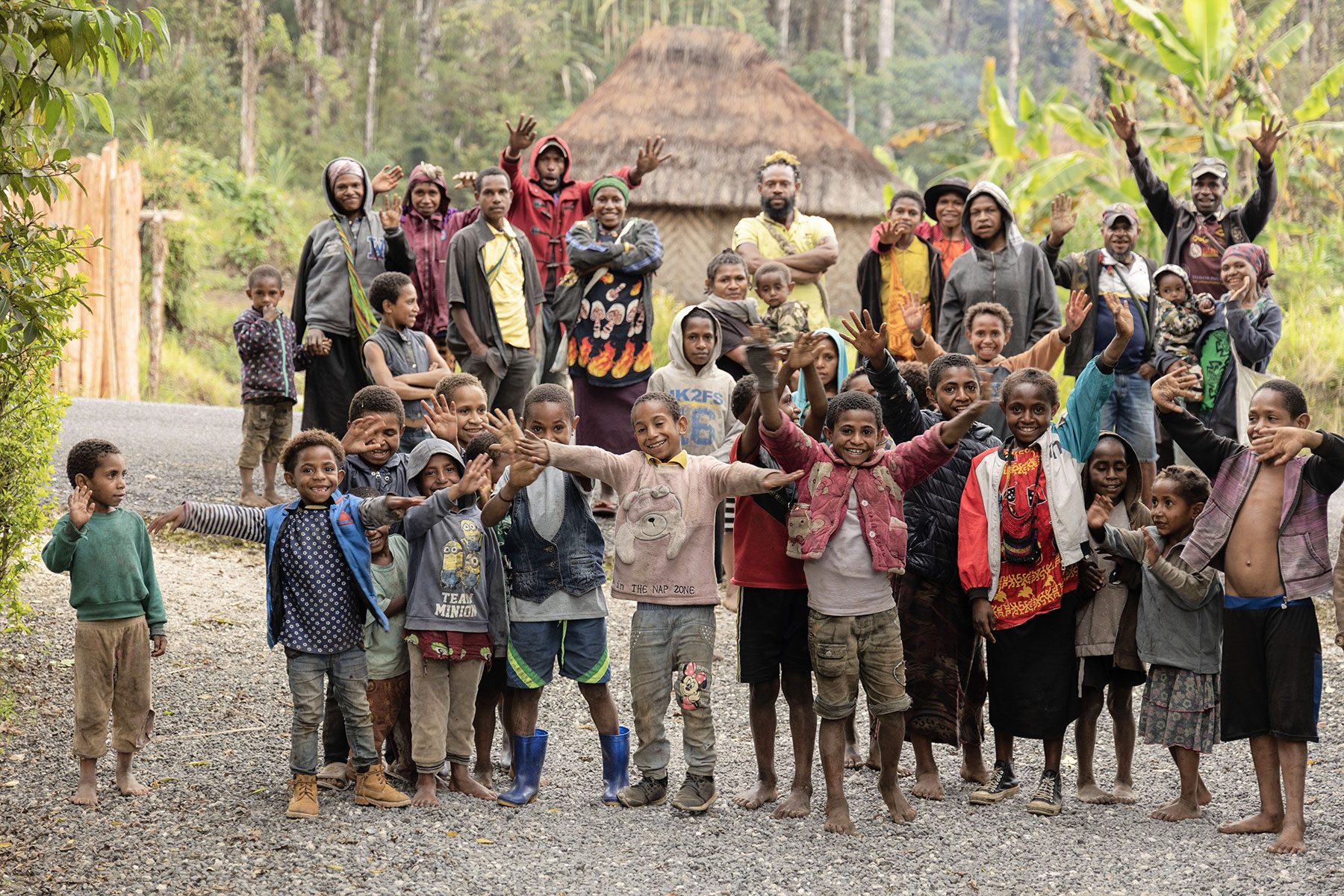 Village People and kids raising hands in happiness