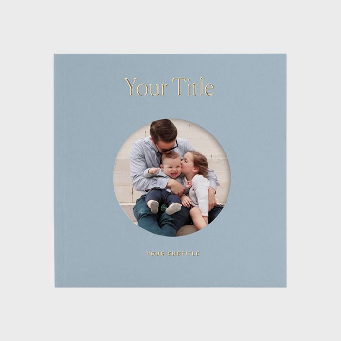 Book cover shows a family cuddling, sitting against a wall. Text: 