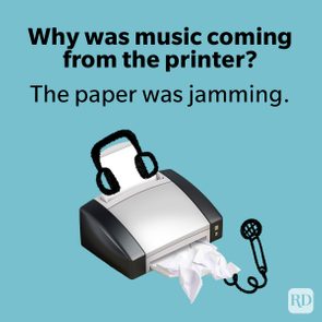 Printer wearing headphones jams paper, resembling musical performance. Text reads: 