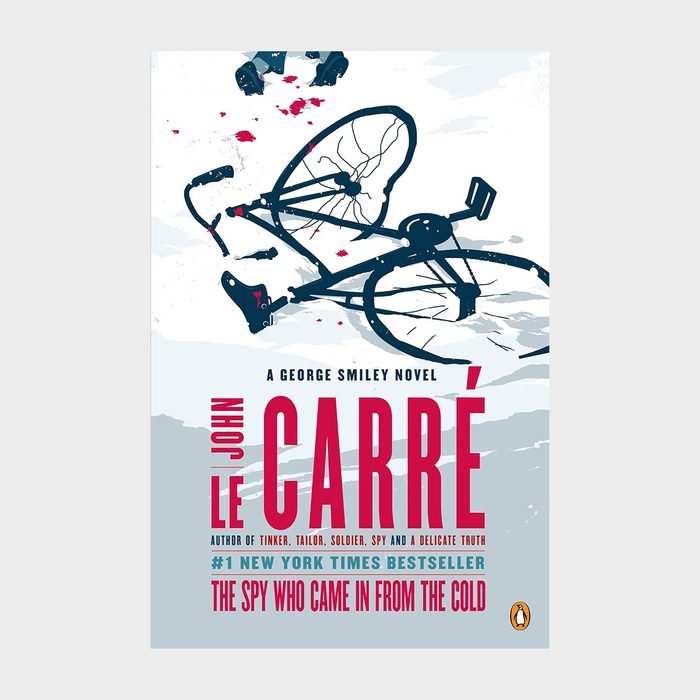 A shattered bicycle lies on icy ground, surrounded by blood splatters. Text reads: 