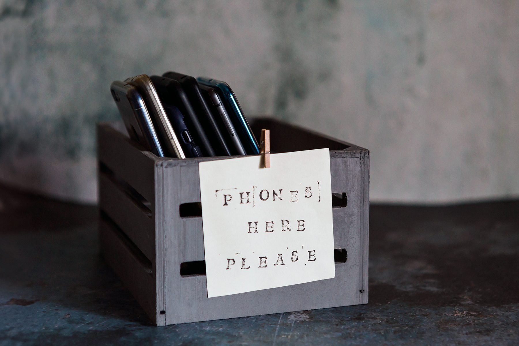 Mobile phone holder with sign