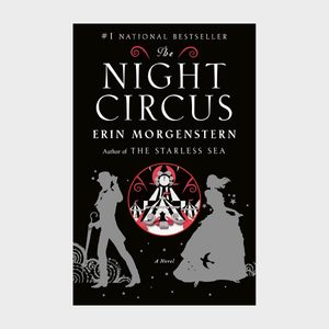 Book cover features silhouettes of two figures and a circus tent illustration; text reads 