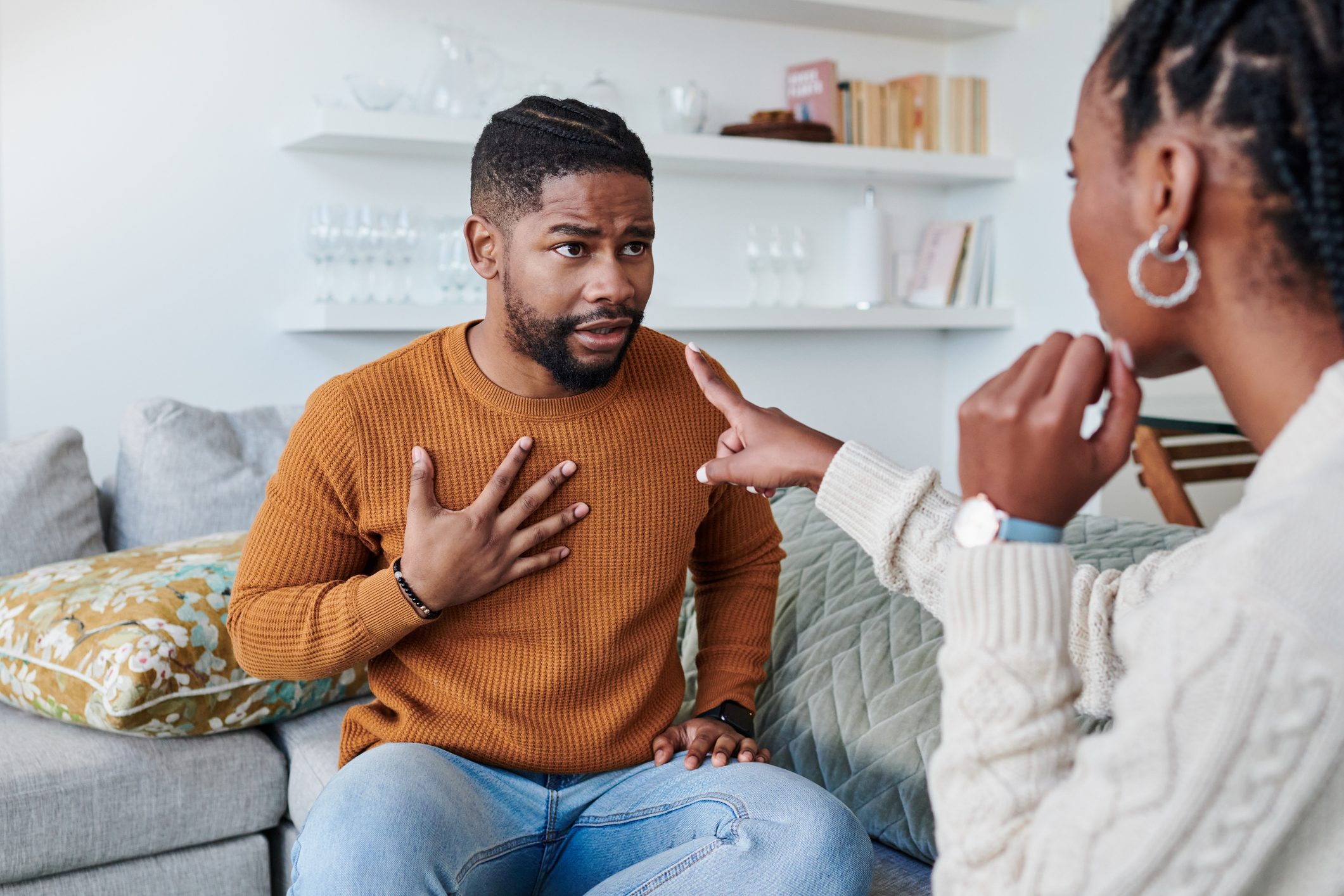 Shot of a young couple having an argument at home