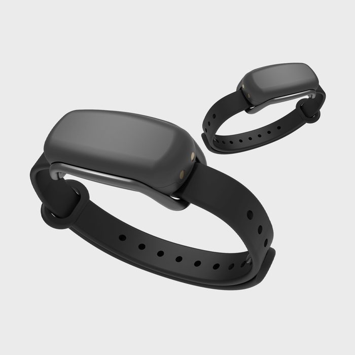 Two black fitness trackers with sleek designs, displayed against a plain gray background.