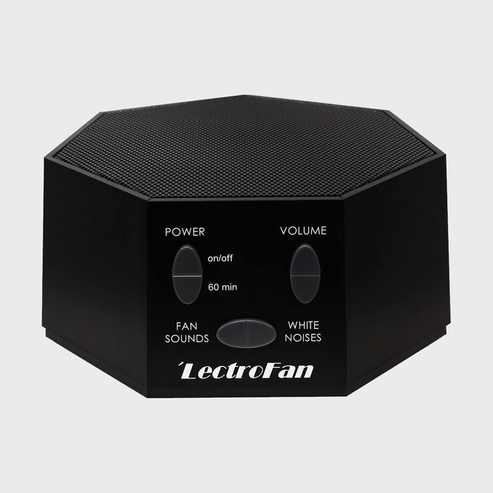 Hexagonal black speaker, displaying buttons labeled 
