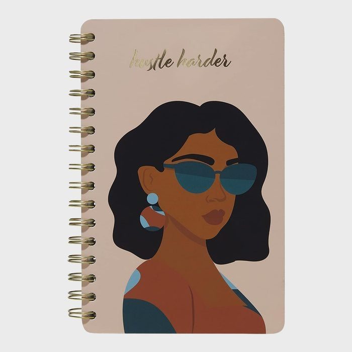 Notebook cover features woman in sunglasses, 