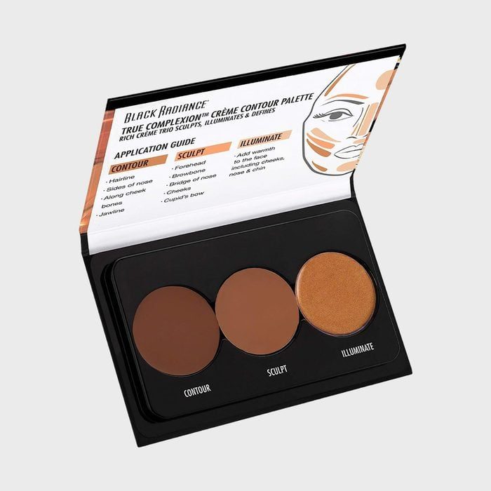 Makeup palette displays three round shades labeled contour, sculpt, illuminate, in open packaging with application guide on the lid.