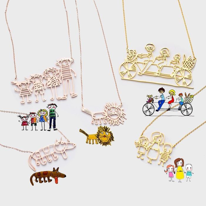 Necklaces depict childrenâ€™s drawings, portraying families, animals, and bicycles; colorful illustrations accompany each design on a light grey background.
