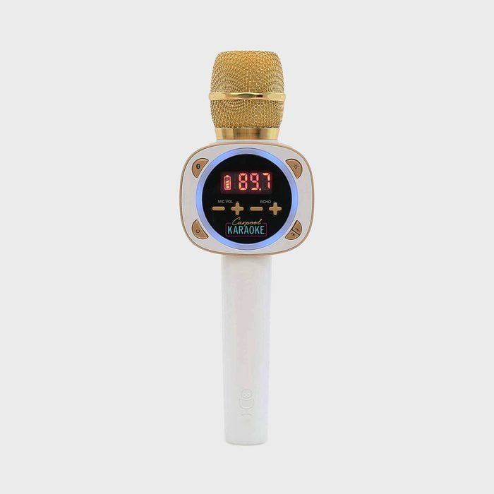 A gold wireless microphone displays 